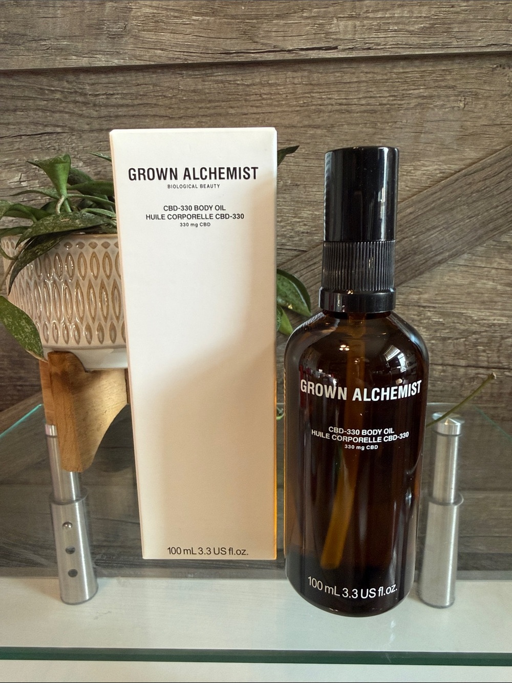 Grown Alchemist Brown and Black CBD-330 Body Oil Bottle